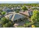 Aerial view of the property surrounded by mature trees in a quiet neighborhood at 5291 S Bradshaw Pl, Chandler, AZ 85249