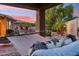 Relaxing covered patio featuring a comfortable hammock and serene outdoor views, enhancing the outdoor living experience at 5291 S Bradshaw Pl, Chandler, AZ 85249