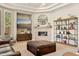 Cozy living room boasts a stone fireplace, media console and a decorative shelving unit at 5291 S Bradshaw Pl, Chandler, AZ 85249