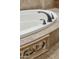 Close up view of the soaking tub with upgraded fixtures at 5291 S Bradshaw Pl, Chandler, AZ 85249