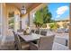 Outdoor patio featuring a dining table and seating area, perfect for entertaining and relaxation at 5291 S Bradshaw Pl, Chandler, AZ 85249