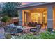 Inviting outdoor patio with stylish seating, dining area, and lush landscaping perfect for relaxation at 5291 S Bradshaw Pl, Chandler, AZ 85249