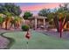 Beautiful backyard with a putting green, offering a perfect space for outdoor recreation and relaxation at 5291 S Bradshaw Pl, Chandler, AZ 85249
