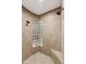 This shower room features a glass block window and shower bench at 5291 S Bradshaw Pl, Chandler, AZ 85249