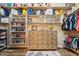 Well-organized walk-in closet featuring a large built-in dresser, shelving, and storage for clothes, shoes, and accessories at 5291 S Bradshaw Pl, Chandler, AZ 85249