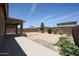 Spacious backyard with well-maintained plants, offering plenty of room for activities at 7648 W Kerby Ave, Phoenix, AZ 85043