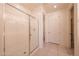 Bathroom featuring glass enclosed shower and neutral tones at 7648 W Kerby Ave, Phoenix, AZ 85043