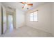 Comfortable bedroom with tile floors, closet, and a window for natural light at 7648 W Kerby Ave, Phoenix, AZ 85043