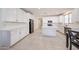 Kitchen featuring white cabinets and stainless steel appliances at 7648 W Kerby Ave, Phoenix, AZ 85043