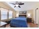 Comfortable primary bedroom with vaulted ceiling, ceiling fan, and an en suite bathroom at 8500 E Southern Ave # 510, Mesa, AZ 85209