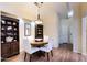 Cozy dining room featuring a round table, stylish chairs, and built-in display cabinets at 8500 E Southern Ave # 510, Mesa, AZ 85209