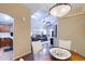 Open-concept dining area leading to a living room with vaulted ceilings and a ceiling fan at 8500 E Southern Ave # 510, Mesa, AZ 85209
