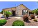 Charming home featuring desert landscaping, a decorative star, and a covered carport at 8500 E Southern Ave # 510, Mesa, AZ 85209
