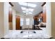 Bright kitchen with skylight, stainless steel appliances, and granite countertops at 8500 E Southern Ave # 510, Mesa, AZ 85209