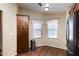 Charming kitchen nook features wood floors, custom cabinetry and natural light at 8500 E Southern Ave # 510, Mesa, AZ 85209