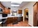 Modern kitchen with sleek countertops, stainless steel appliances, and a seamless connection to the dining room at 8500 E Southern Ave # 510, Mesa, AZ 85209