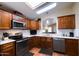 Well-equipped kitchen with stainless steel appliances, granite countertops, and ample cabinet space at 8500 E Southern Ave # 510, Mesa, AZ 85209