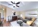Open living room with vaulted ceilings and seamless transition to the modern kitchen at 8500 E Southern Ave # 510, Mesa, AZ 85209