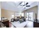 Bright living room with vaulted ceilings, ceiling fan, and sliding glass doors to the patio at 8500 E Southern Ave # 510, Mesa, AZ 85209