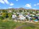 Residential area adjacent to a golf course with views of the mountains in distance at 8653 S 51St St # 2, Phoenix, AZ 85044
