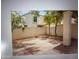 Private backyard patio with red brick pathway and gravel bed at 8653 S 51St St # 2, Phoenix, AZ 85044