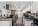 Bright kitchen features stainless steel appliances, ample counter space, and white cabinetry at 8653 S 51St St # 2, Phoenix, AZ 85044