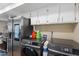 Laundry room features stainless steel washer and dryer and plenty of cabinet space at 8653 S 51St St # 2, Phoenix, AZ 85044