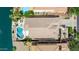 Aerial view of the backyard featuring a sparkling pool and lake access at 896 E Indian Wells Pl, Chandler, AZ 85249