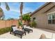 Relaxing backyard featuring chaise lounges and a patio area, perfect for outdoor living at 896 E Indian Wells Pl, Chandler, AZ 85249