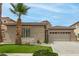 Single-story home with desert landscaping, tile roof, and a two-car garage at 896 E Indian Wells Pl, Chandler, AZ 85249