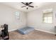 Bedroom featuring carpeted floors, a ceiling fan, and window at 913 W Yosemite Dr, Chandler, AZ 85248