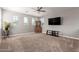 Spacious bonus room with carpet, decorative shelving and arched windows at 913 W Yosemite Dr, Chandler, AZ 85248