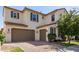 Stunning two-story home with a two-car garage and beautiful brick driveway at 913 W Yosemite Dr, Chandler, AZ 85248