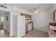 Functional kitchen with a full-size refrigerator and standard appliances, ready for your culinary adventures at 9265 N 111Th Ave, Sun City, AZ 85351