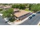 Aerial view of the home showcasing the tile roof, backyard layout and two cars parked out front at 948 E Savannah Dr, Chandler, AZ 85225