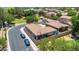 Aerial shot featuring the property's backyard with a covered patio and nearby community park at 948 E Savannah Dr, Chandler, AZ 85225