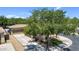 View of the home showcasing a well-maintained yard, driveway, and desert landscaping at 948 E Savannah Dr, Chandler, AZ 85225