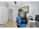 Another view of the bright home office with a neutral color palette and ample workspace at 948 E Savannah Dr, Chandler, AZ 85225