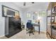 Functional home office featuring a large filing cabinet, desk, and shelving for storage at 948 E Savannah Dr, Chandler, AZ 85225