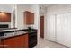This kitchen has stainless steel appliances, a tiled floor, and plenty of storage space at 9820 N Central Ave # 321, Phoenix, AZ 85020