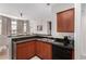 This kitchen features stainless steel appliances, granite countertops, and ample cabinet space at 9820 N Central Ave # 321, Phoenix, AZ 85020