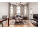 Bright living room with mountain views featuring a cozy couch and dining area at 9820 N Central Ave # 321, Phoenix, AZ 85020