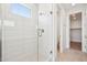 Modern bathroom with a large shower and a doorway to the toilet and walk-in closet at 10253 E Ursula Ave, Mesa, AZ 85212