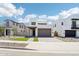 Modern two-story home boasts clean lines, a two-car garage, and contemporary curb appeal in a community at 10253 E Ursula Ave, Mesa, AZ 85212