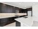 Modern kitchen with stainless steel appliances, a large island, and recessed lighting at 10253 E Ursula Ave, Mesa, AZ 85212