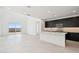 Modern kitchen with stainless steel appliances, large island, and bright, open space at 10253 E Ursula Ave, Mesa, AZ 85212