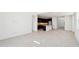 Bright open-concept floorplan features tile flooring, a kitchen with island, and natural light at 10253 E Ursula Ave, Mesa, AZ 85212