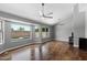 Bright living room featuring large windows with views of the pool and backyard at 11131 E Becker Ln, Scottsdale, AZ 85259