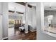 Open living space with high ceilings, wood floors, and neutral-toned gray decor at 11131 E Becker Ln, Scottsdale, AZ 85259