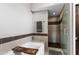 Luxurious shower featuring dual shower heads and modern tile design at 11131 E Becker Ln, Scottsdale, AZ 85259